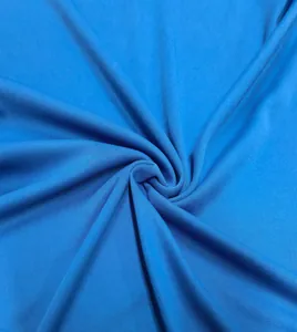 Macro view of blue knitted fabric texture for men's slim fit long-sleeve polo shirt