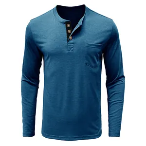 Detail view of men's blue long-sleeve Henley shirt with chest pocket and buttons