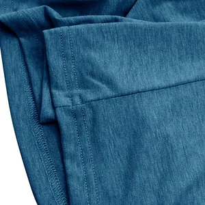 Close-up detail showing stitching and breathable cotton fabric of men's T-shirt