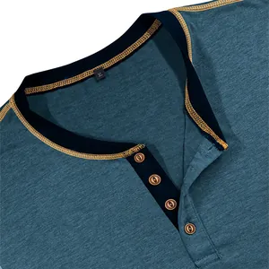 Close-up detail of men's Henley shirt neckline with contrast stitching and buttons
