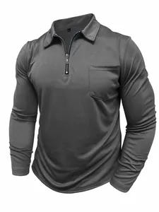 Men's dark grey long-sleeved polo shirt featuring zip collar and chest pocket detail