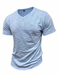 Close-up detail of light blue slub cotton V-neck t-shirt for men showing soft fabric texture