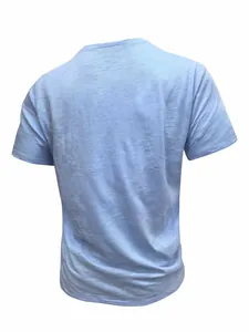 Detailed back view of a light blue men's slub cotton t-shirt with fabric texture