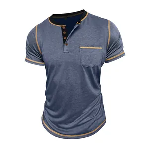 Detail showing heathered texture and yellow contrast stitching on blue Henley shirt