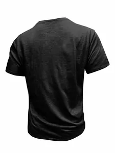 Back view of a classic men's slub cotton short sleeve t-shirt in solid black color