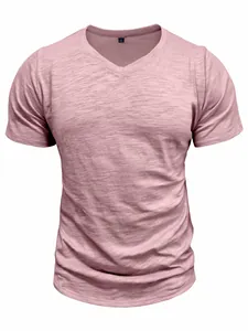 Detailed view of men's slub cotton V-neck t-shirt in pink with fine fabric texture