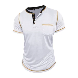 Detailed view of men's white Henley shirt with contrast stitching and chest pocket