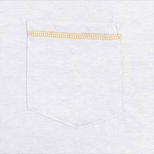 Close-up detail of a white men's Henley shirt pocket with yellow decorative stitching