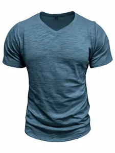 Close-up detail of the blue slub cotton fabric on a casual men's V-neck short sleeve T-shirt