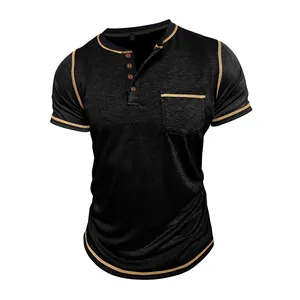 Detailed view of the black short sleeve Henley shirt with golden contrast piping trim
