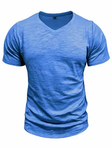 Close-up of light blue slub cotton texture on a men's V-neck short sleeve T-shirt.