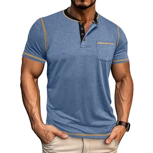 Close-up of blue men's Henley shirt with contrast collar and yellow stitching