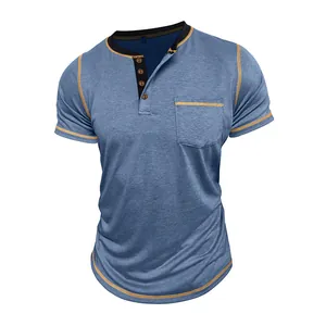 Detailed view of men's blue moisture-wicking Henley shirt with gold stitching