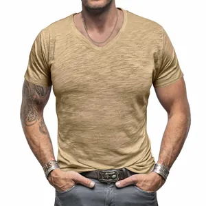 Close-up of men's khaki slub cotton short sleeve V-neck T-shirt showing fabric texture