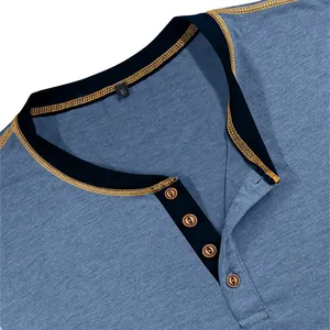 Detail of men's blue Henley shirt showing contrast navy collar and buttons