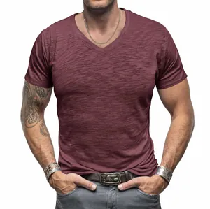 Close-up of men's burgundy slub cotton V-neck T-shirt highlighting the premium fabric texture