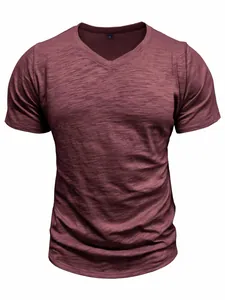 Close-up of the textured burgundy slub cotton fabric on a men's V-neck short sleeve shirt