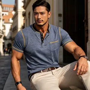 Casual men's short-sleeved blue Henley shirt with yellow stitching in a street setting