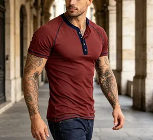 Close-up view of a men's slim-fit maroon Henley T-shirt featuring navy contrast trim details