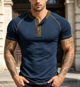 Detailed view of a navy blue short sleeve Henley shirt featuring contrast stitching