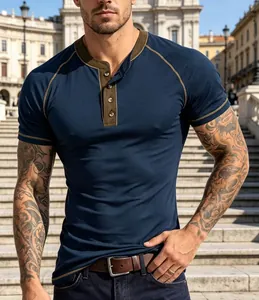 Close-up of navy blue Henley shirt with olive green raglan sleeves and three-button placket