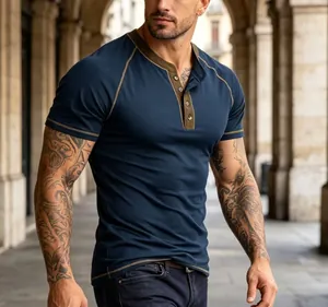 Close-up of a navy blue Henley t-shirt featuring contrast olive green stitching and collar