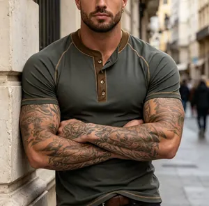 Detail view of men's slim fit Henley t-shirt with contrast stitching and buttons