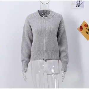 Minimalist gray ribbed knit zip-up cardigan sweater for women in a slouchy style