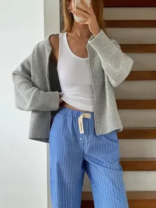 Cozy grey long-sleeved zip-up knit sweater cardigan for casual lazy style outfits.