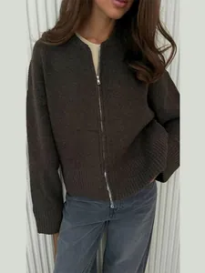 Loose dark brown knit cardigan with front zipper and long sleeves on white background