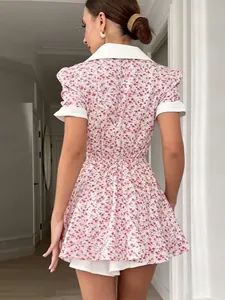 Back view of a French-style floral mini dress featuring a white doll collar and A-line cut