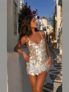 Glamorous silver sequin V-neck camisole mini dress for party and club wear.