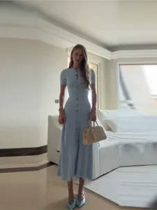 Elegant light blue sequined knit maxi dress with slim fit design for stylish women
