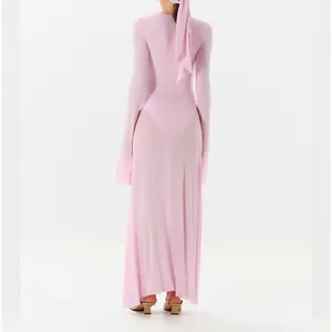 Back view of elegant pink long-sleeved maxi dress with flared trumpet sleeves