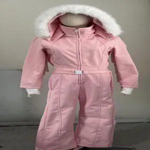 Detailed view of a pink women's one-piece ski suit with a white fur-trimmed hood