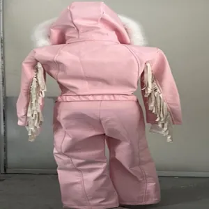 Back view of pink hooded ski jumpsuit showing white faux fur and fringe details