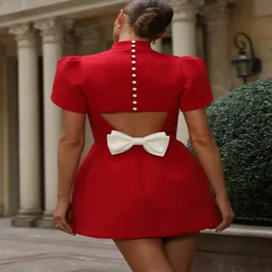 Elegant red high neck backless mini dress with decorative white bow and back buttons