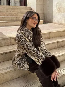 Leopard print faux fur jacket with stand collar and dark fur cuffs on sleeves