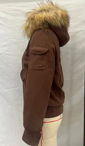 Side view of vintage brown short jacket featuring a plush faux fur hood and sleeve pocket