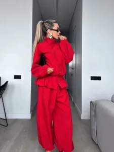 Retro red stand-collar jacket with elegant lantern sleeves and matching wide-leg trousers