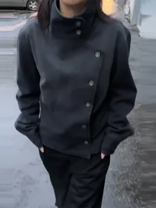 Vintage black stand-collar workwear jacket for women featuring diagonal buttons street style