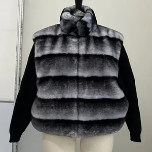 Faux fur patchwork jacket with black knit sleeves and elegant grey striped pattern