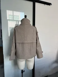 Back view of a beige commuter style stand collar short wool coat for women