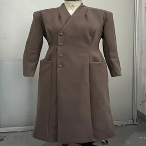 Elegant long brown wool coat with padded shoulders and cinched waist for women, winter style.