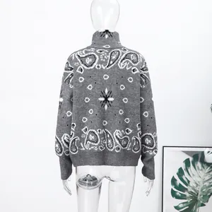 Back view detail showing the intricate paisley print on a grey knitted zip cardigan