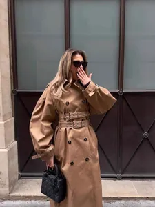 Stijlvolle herfst kaki trenchcoat met dubbele taille riem en modieuze pofmouwen.