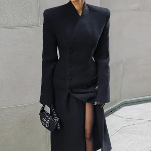 Elegant black long wool-style coat with structured padded shoulders and cinched waist
