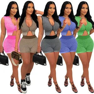 Detailed view of women's two-piece knitted set with two-way front zippers in multiple colors