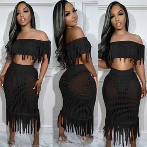 Sexy black hollow out crochet two-piece set with fringe detailing for beach wear