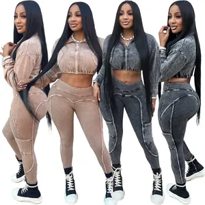 Detail of women's acid wash ribbed two-piece leisure set in beige and grey colors